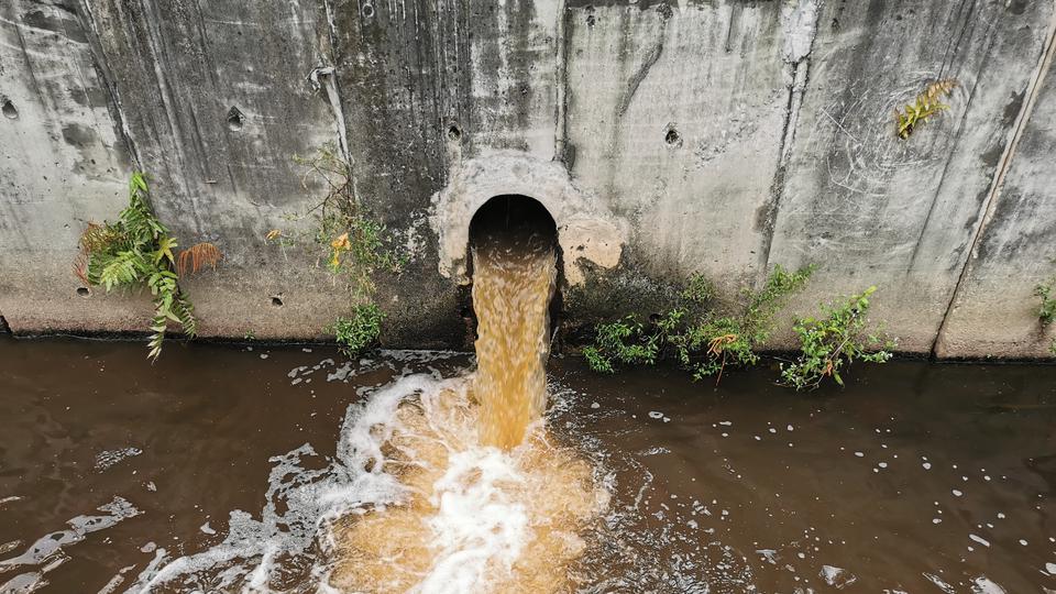 Water outflows through flood drainage system