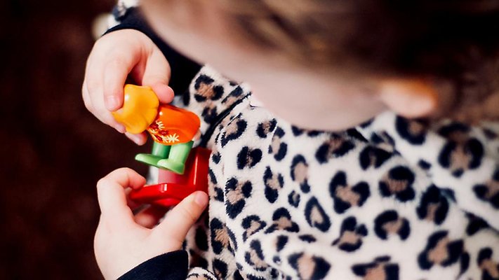 Child playing with toy